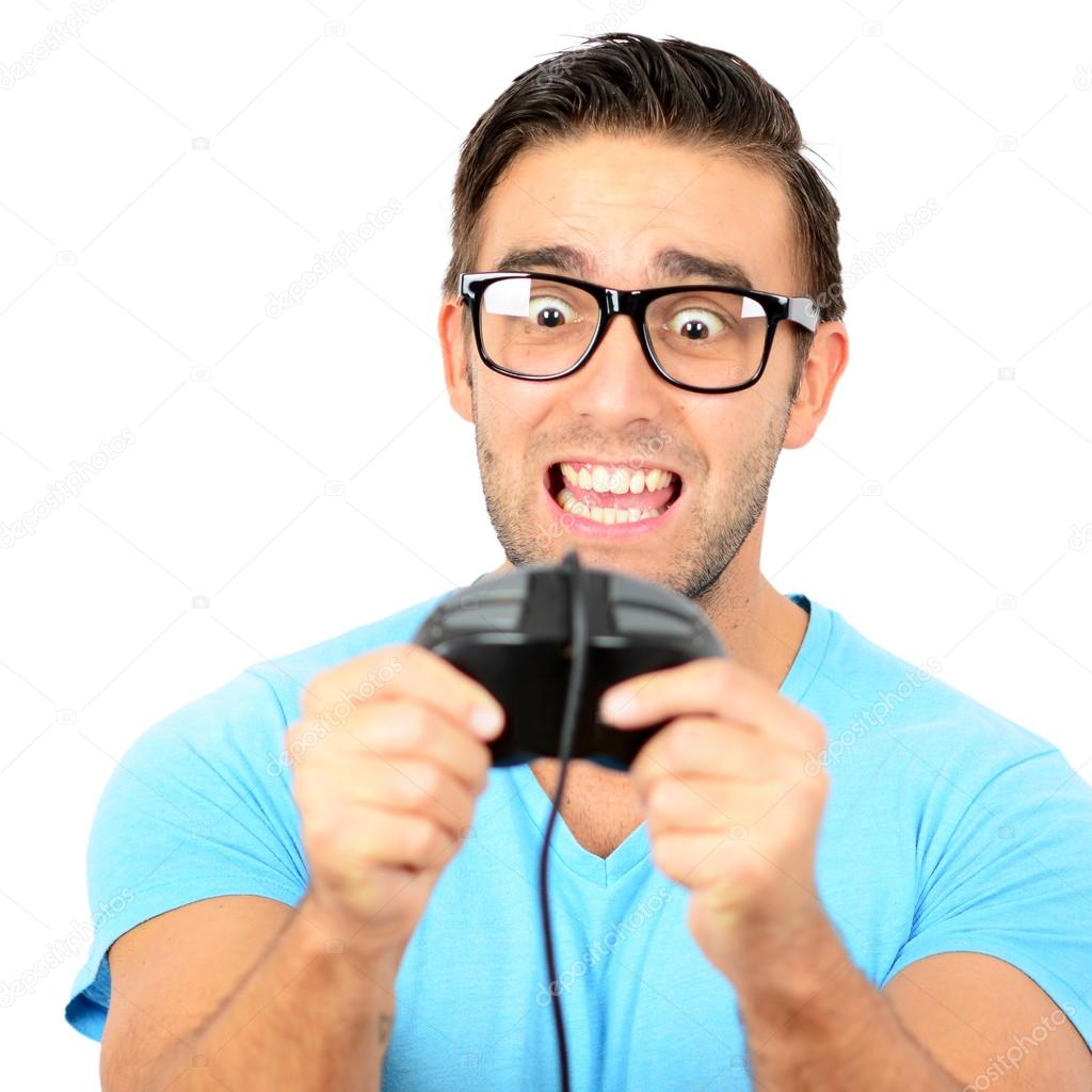 Portrait of handsome man holding joystick for video games agains