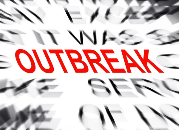 Testo blured con focus su OUTBREAK — Foto Stock