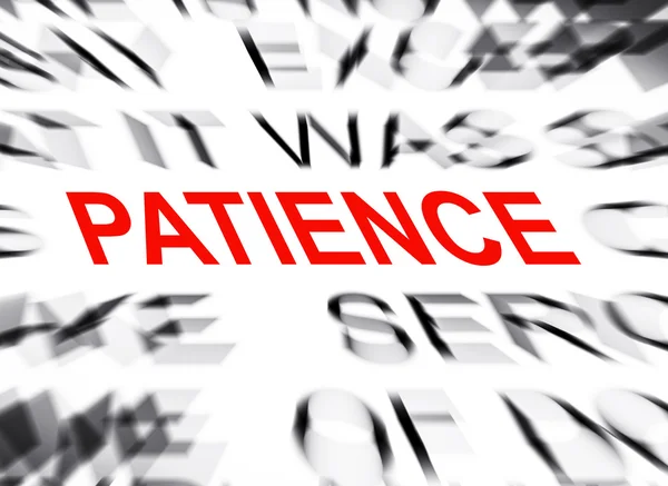 Blured text med fokus på tålamod — Stockfoto