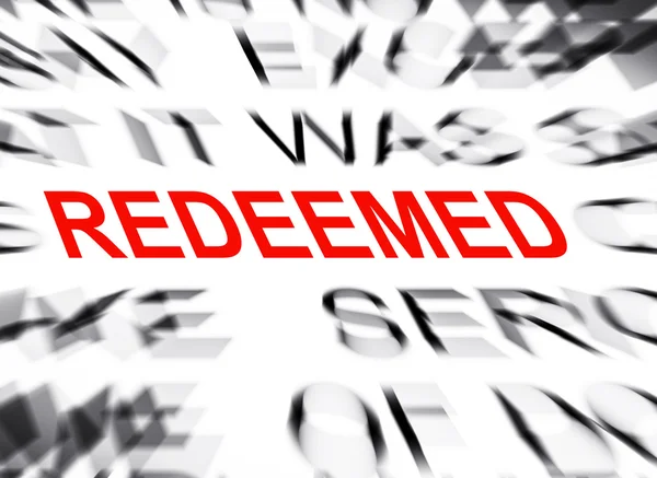 Blured text with focus on REDEEMED — Stock Photo, Image