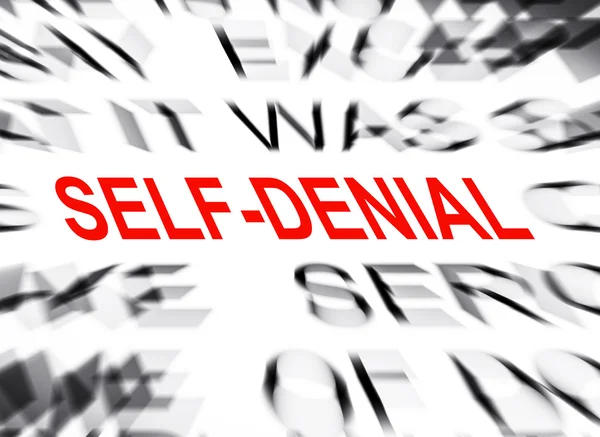 Blured text with focus on SELF DENIAL — Stock Photo, Image