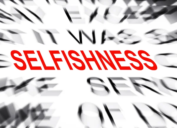 Блакитний текст з фокусом на SELFISHNESS — стокове фото