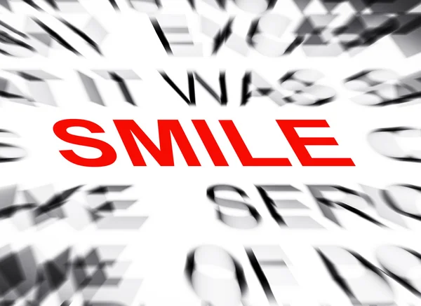 Teks kabur dengan fokus pada SMILE — Stok Foto