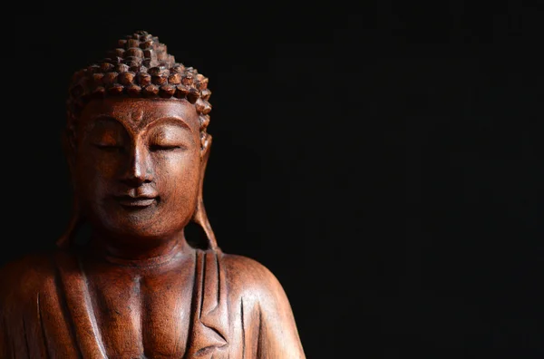 Buddha portrait against dark background — Stock Photo, Image