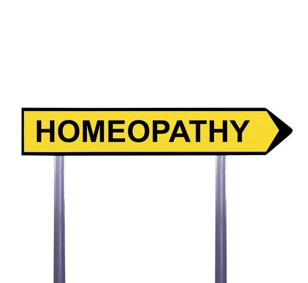 Концептуальный знак стрелки изолирован на белом - HOMEOPATHY — стоковое фото