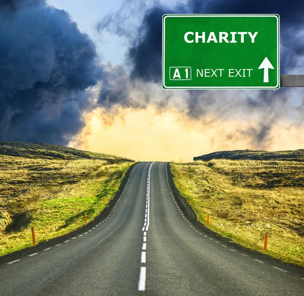 CHARITY road sign against clear blue sky — Stock Photo, Image