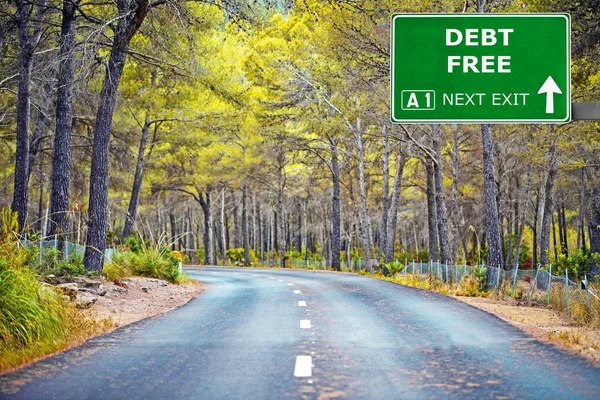 Señal de carretera DEBT FREE contra cielo azul claro — Foto de Stock