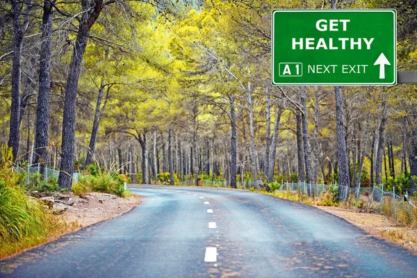 GET HEALTHY road sign against clear blue sky — Stock Photo, Image