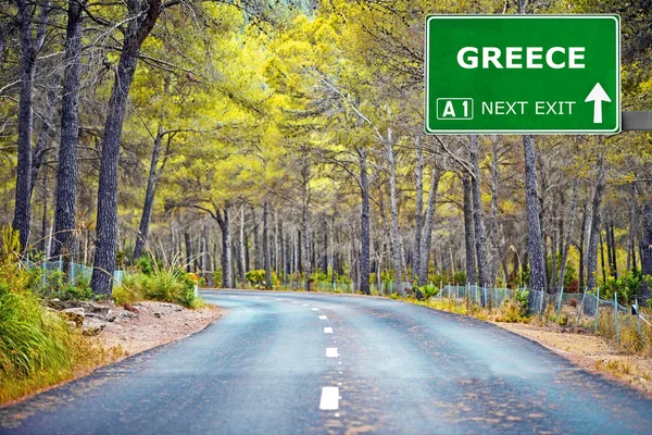 GREECE road sign against clear blue sky — Stock Photo, Image