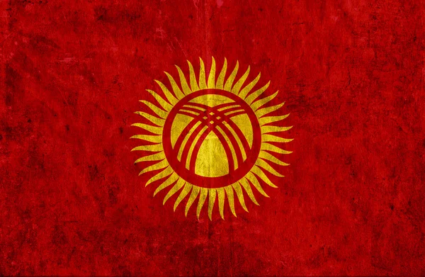Grungy paper flag of Kyrgyzstan — Stock Photo, Image