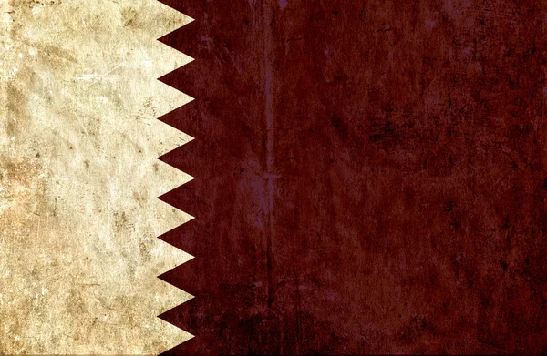 卡塔尔的又脏又臭的纸制国旗 — 图库照片