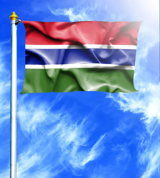 Blue sky and mast with hanged waving flag of Gambia — Stock Photo, Image