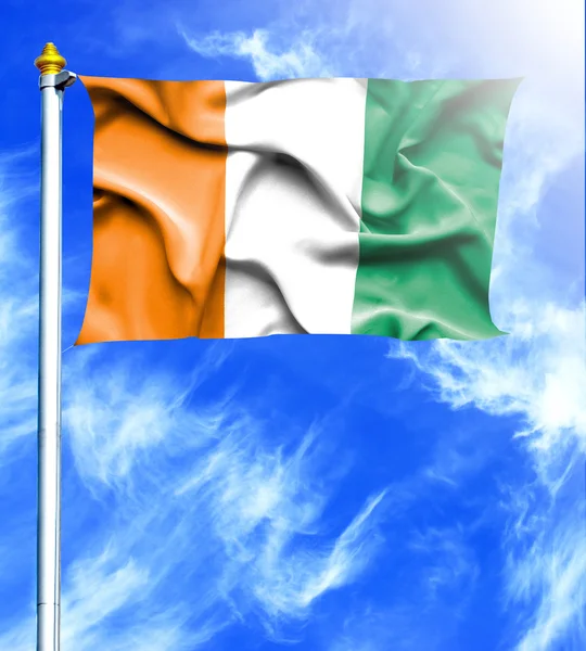 Blue sky and mast with hanged waving flag of Ivory Coast — Stock Photo, Image