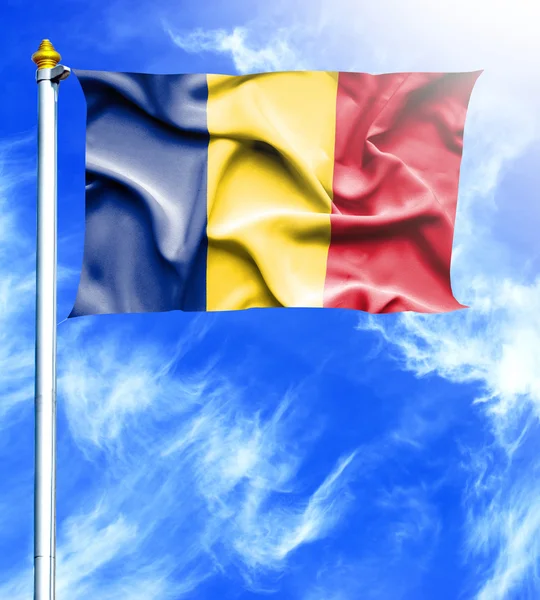 Blue sky and mast with hanged waving flag of Romania — Stock Photo, Image