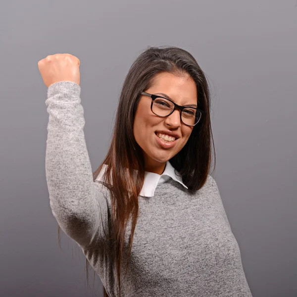 Portrait of happy woman exults pumping fists ecstatic celebrates — Stock Photo, Image