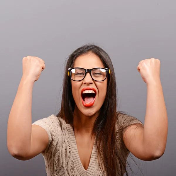 Portrait of happy woman exults pumping fists ecstatic celebrates — Stock Photo, Image