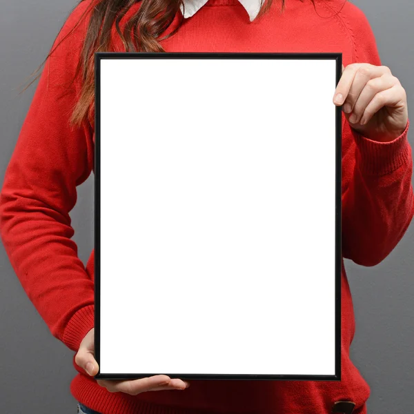 Woman holding empty frame with space for your advertisement agai — Stock Photo, Image