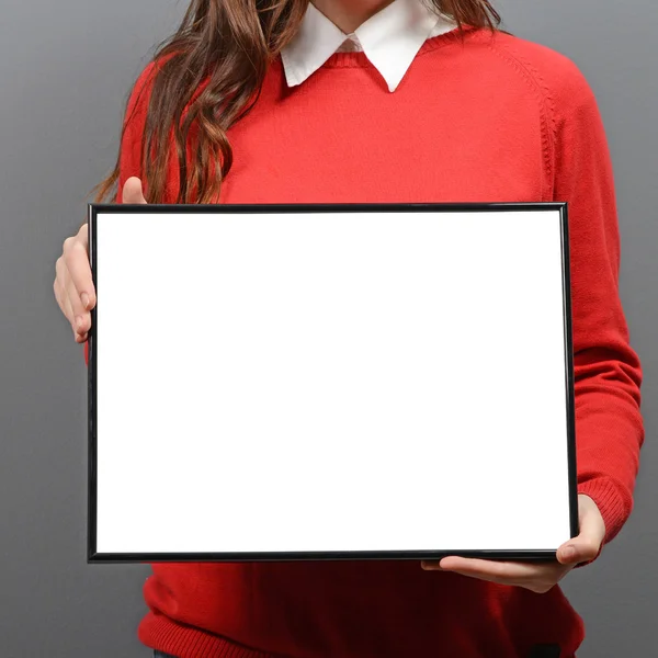 Woman holding empty frame with space for your advertisement agai — Stock Photo, Image