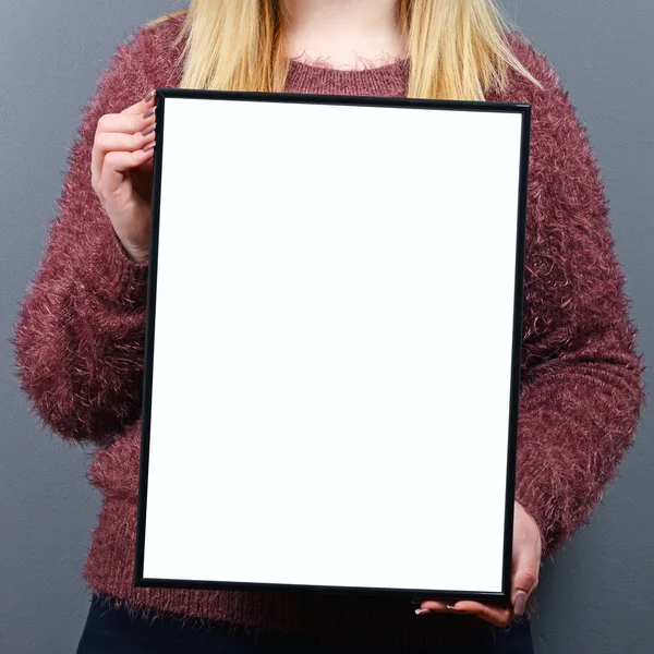 Portrait of woman holding blank sign board — Stock Photo, Image