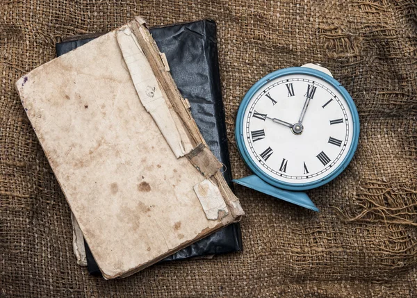 Vintage alarm clock on vintage background — Stock Photo, Image