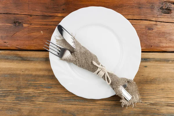 Empty Plate Fork Knife Dark Old Wood Background — Stock Photo, Image