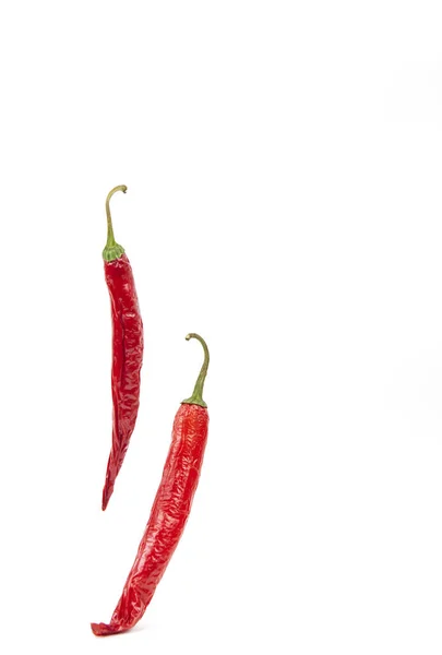 Falling Red Chili Chilli Pepper White Background — Stock Photo, Image