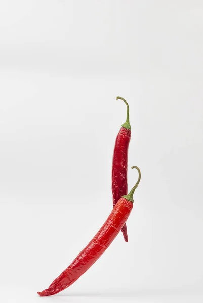 Falling Red Chili Chilli Pepper White Background — Stock Photo, Image