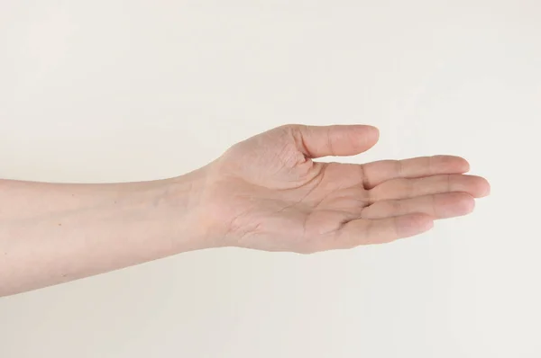 手和胳膊紧贴在白色的背景上 可用于展示您的产品 — 图库照片
