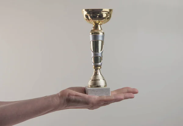 Woman Holding Gold Trophy Cup White Background Closeup — Stock Photo, Image