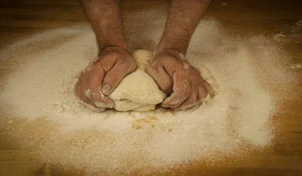 Baking Concept Unrecognizable Man Hands Top View Knead Dough Wooden — Stock Photo, Image