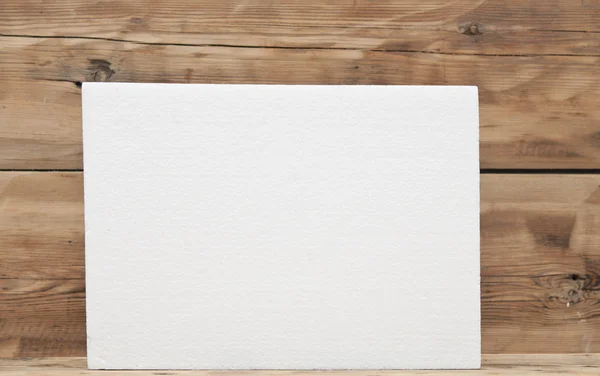 Polyfoam texture on wood background — Stock Photo, Image