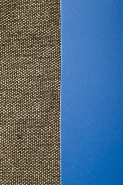 Säckväv på blå bakgrund med kopia utrymme — Stockfoto