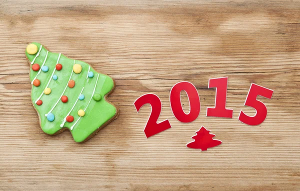 Bolinho de Natal 2015 em mesa de madeira — Fotografia de Stock