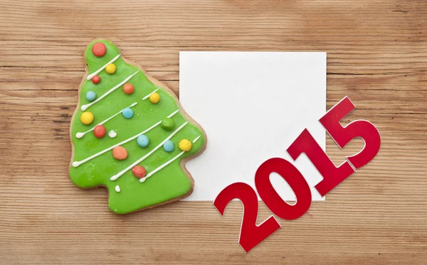 Bolinho de Natal 2015 em mesa de madeira — Fotografia de Stock