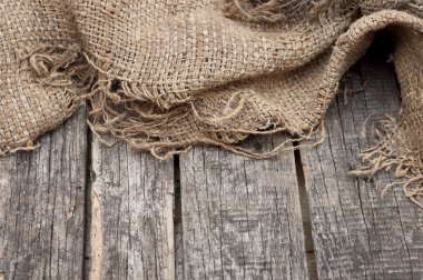 ahşap masa arka plan üzerine çuval bezi doku
