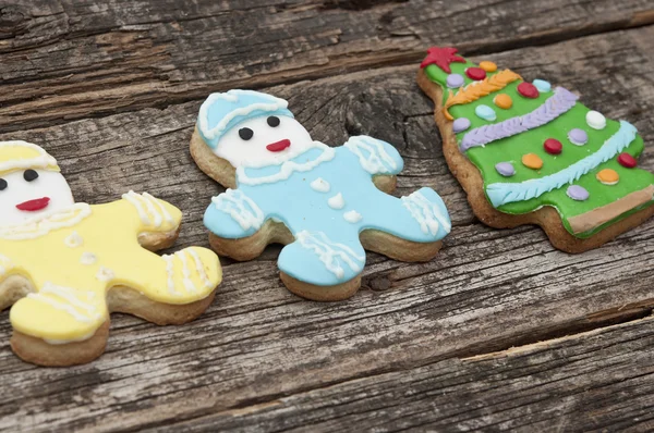 Holiday cookie on rustic wooden background for the holidays — Stock Photo, Image