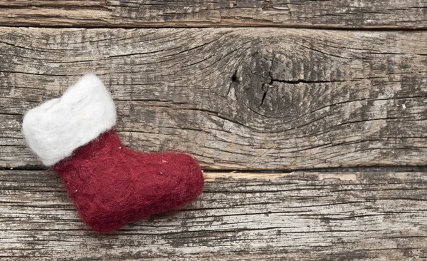 Santa of Kerstmis boot op een houten achtergrond voor een groet-ca — Stockfoto