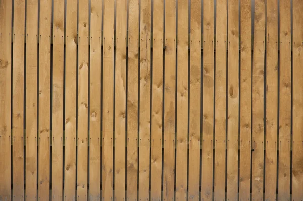 Struttura in legno chiaro con assi verticali pavimento, tavolo, parete sur — Foto Stock