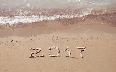 kum okyanus plaj üzerinde yazılı 2017