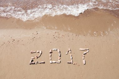kum okyanus plaj üzerinde yazılı 2017