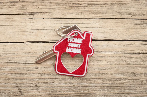 Sign home sweet home on rustic wood — Stock Photo, Image