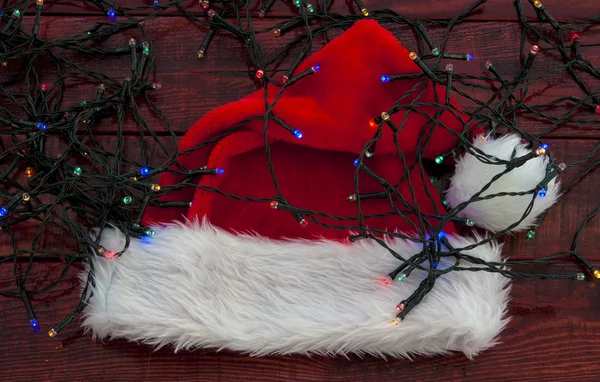 Weihnachtsmann auf Holztisch — Stockfoto