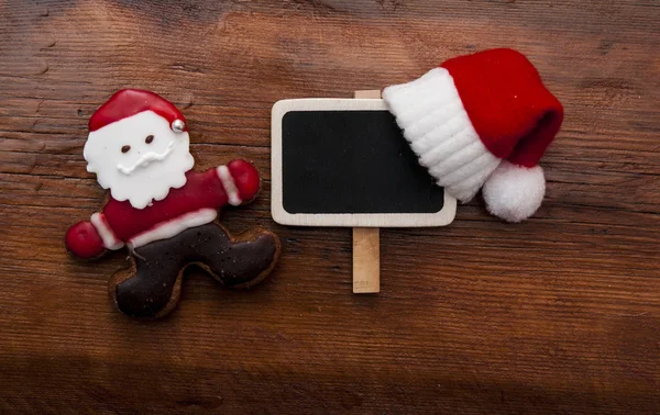 Weihnachtsplätzchen auf dem hölzernen Hintergrund — Stockfoto