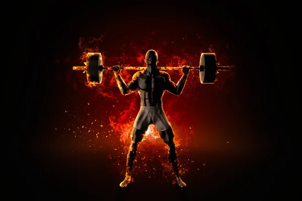 Ferocious flaming bodybuilder with barbell — Stock Photo, Image