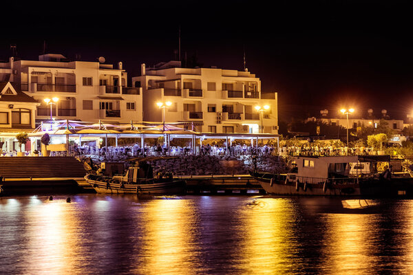 Traditional Greek fish restaurant at Zygi village at night. Larnaca District, Cyprus.
