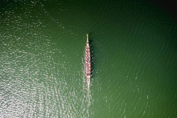 Dragon boat racing team. Overhead view