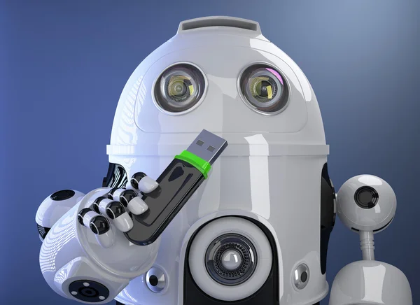 Robot holding USB memory stick. Contains clipping path — Stock Photo, Image