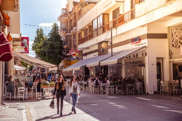 NICOSIA - APRIL 13 : People walking on Ledra street on April 13, 2015 in Nicosia, Cyprus. It is is a major shopping thoroughfare in central Nicosia — Stock Photo, Image