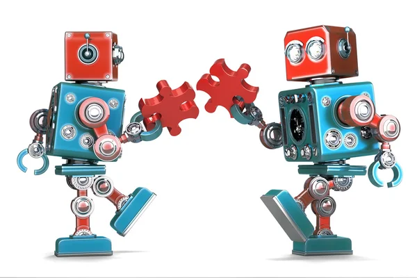 Retro Robots assembling jigsaw puzzle pieces. Isolated. Contains clipping path — Stock Photo, Image