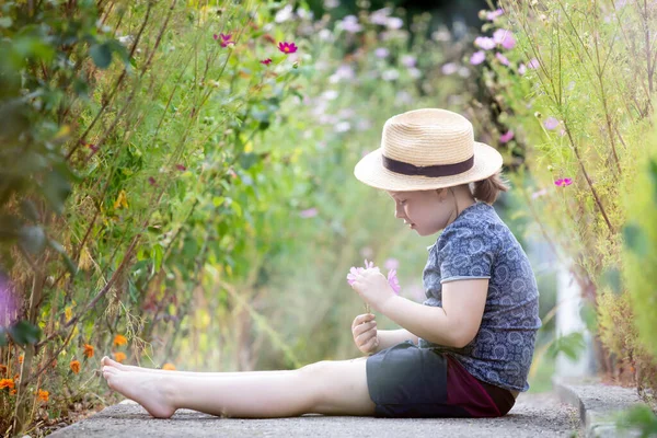 Little Adorable Girl Sitting Colorful Flower Garden Enjoying Autumn Sunlight — Stock Photo, Image